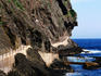 Coastal path at foot of cliff.