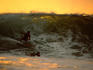 Surfer on a wave known as Desert Point, Bangko Bangko.