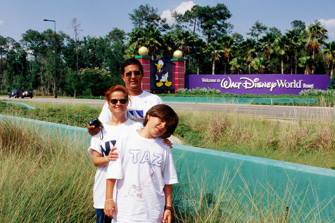 Portrait of family outside Disneyworld.