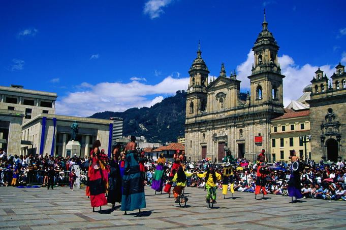 Crowds gather to watch street theatre performances in the Plaza de Bolivar - Bogota, Bogota Capital District