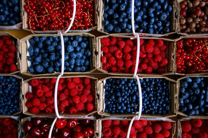 Overhead of punnets of berries, Jean Talon Market.