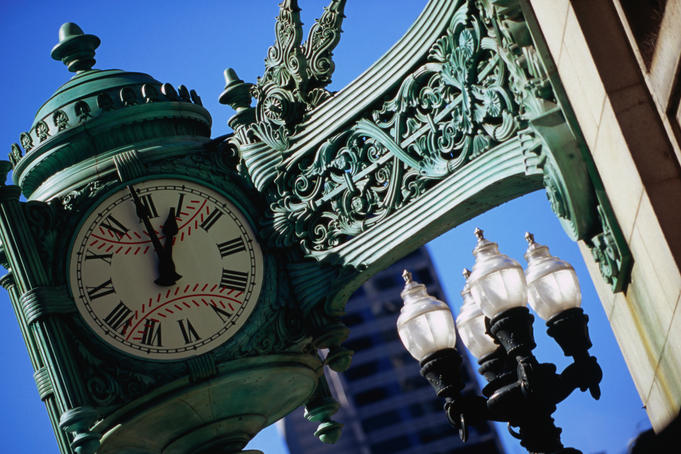 Marshall Field Building with baseball faced clock detail.