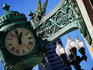 Marshall Field Building with baseball faced clock detail.