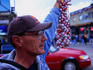 Man selling trinkets at Wrigley Field during the playoffs.