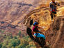 Woman rappelling, Kanheli Caves, Borivali.