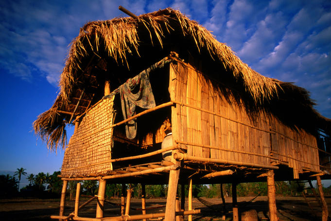 Fisherman's cottage with thatched roof and walls.