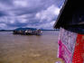 Overhead of pile-house cluster across the water, Jampung Halo.