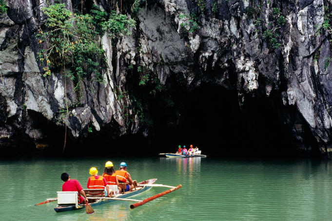 Outriggers at entrance to Underground River.