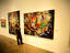 A woman looking at artwork at the Nati Hispanic Cultural Center.