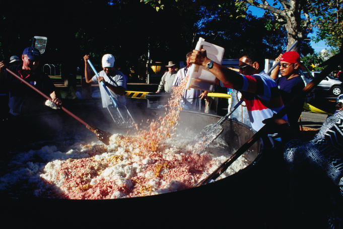 Making Australia's largest fried rice at the Easter Sunrice Festival.
