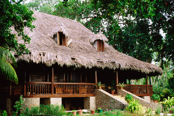 Thatched roof lodge.