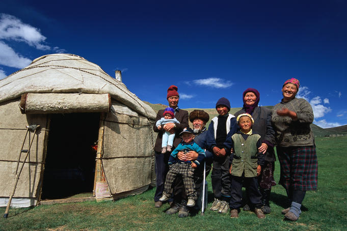 Krygz family portrait outside summer yurt, outside of Kochkor.