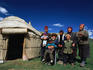 Krygz family portrait outside summer yurt, outside of Kochkor.