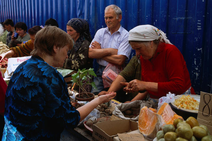 Fresh vegetable stall in the Green Market at Zelyony Bazaar.
