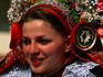 Young single woman in traditional costume during Ride of the Kings Festival in Vlcnov, Uherskohradistska Wine Region.