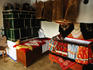 Ceramic stove and clothing in traditional house museum in Vlcnov, Uherskohradistska Wine Region.