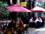 Alfresco drinkers outside Occidental Hotel, Vulcan Lane.