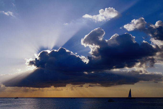 Sunset shining through clouds.