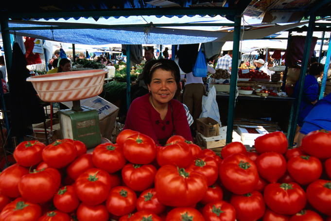 Tomato seller in Green Market, Zelyony Bazaar.