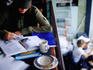 A customer drawing at the Bauhaus Coffeeshop in the Pike/Pine Corridor.