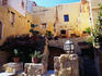 Roofless Restaurant: tables and chairs among the ruins - Hania, Hania Province, Crete