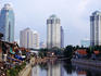Looking down the canal to the city skyline, Jakarta