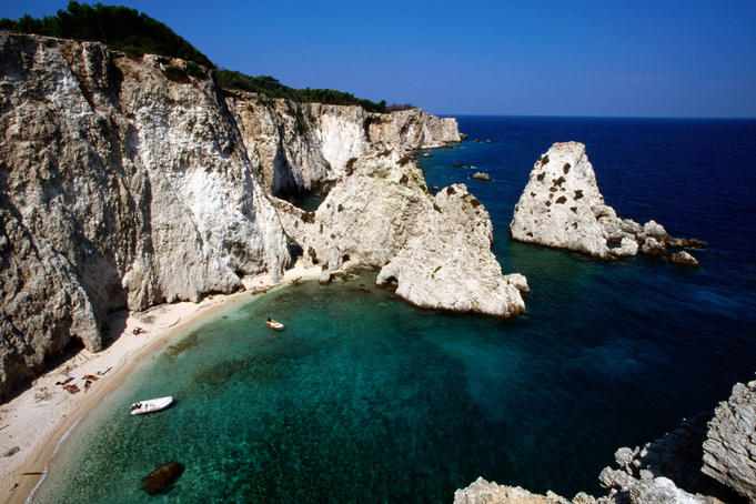Cliffs and secluded beach coastline.