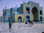 People walking outside Shrine of Hazrat Ali (Blue Mosque).