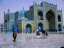 People walking outside Shrine of Hazrat Ali (Blue Mosque).