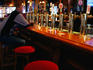 Customer at bar of Madison Avenue pub.