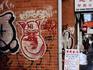 Graffiti and Chinese signs mark boundary of Kensington Market.