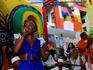 Afro-Cuban singer performing rhumba at Callejon de Hamel (Salvador's Alley).