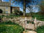 Churchyard gate and stone house, Swinbrook, Cotswolds.