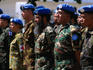 UN multinational Peace Keepers on parade to honour change of leader.