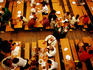 Overhead of Oktoberfest beer-drinking session in tent at Theresienwiese fairgrounds.