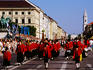 Spectators and participants in traditional costume during annual brewer's parade, Oktoberfest.