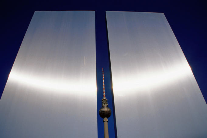 Television tower (Fernsehturm) near steel slabs in Marx-Engels-Forum square.