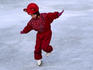 Child skating on ice in Kungstradgarden.