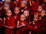 Novice monks watching Mahakala Puja during Losar (Tibetan New Year) at Kopan monastery.