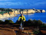 Biking above Algarve coast near Lagos.