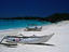 Boats on beach at Galawa Beach Resort.