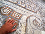 Hand on mosaic, Curetes Way.