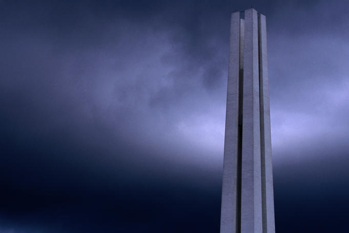 Civilian War Memorial at night.