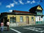 Painted buildings with rusted iron roofs, San José