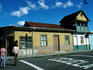 San Jose street-scene: painted buildings with rusted iron roofs