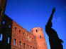 Roman statue in front of Porta Palatina, Roman Gate.