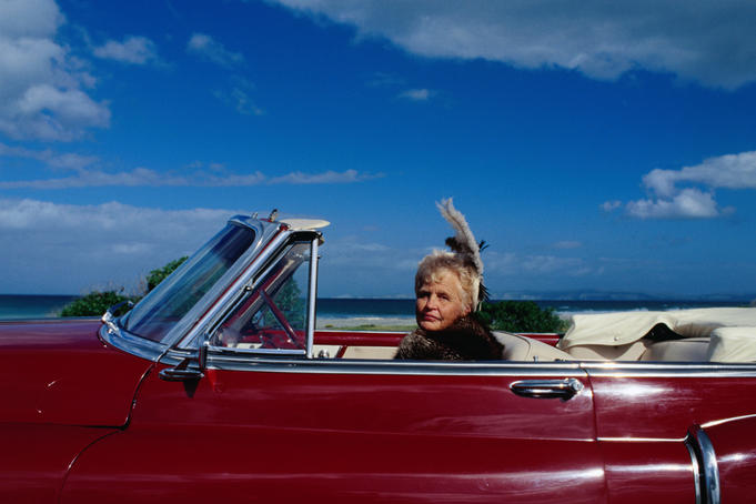 Women sitting in car at Deco Festival.