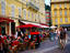 People sitting at outdoor cafe in Cours Saleya on French Riviera.