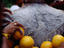 Oranges hanging from piercings on a devotee's back, Thaipusam Festival.