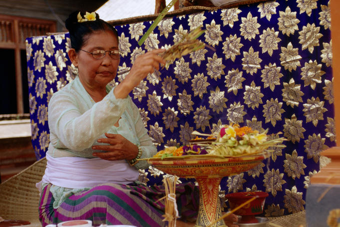 Female priest at marriage ceremony.